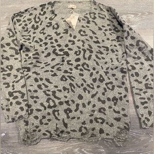 Distressed leopard sweater